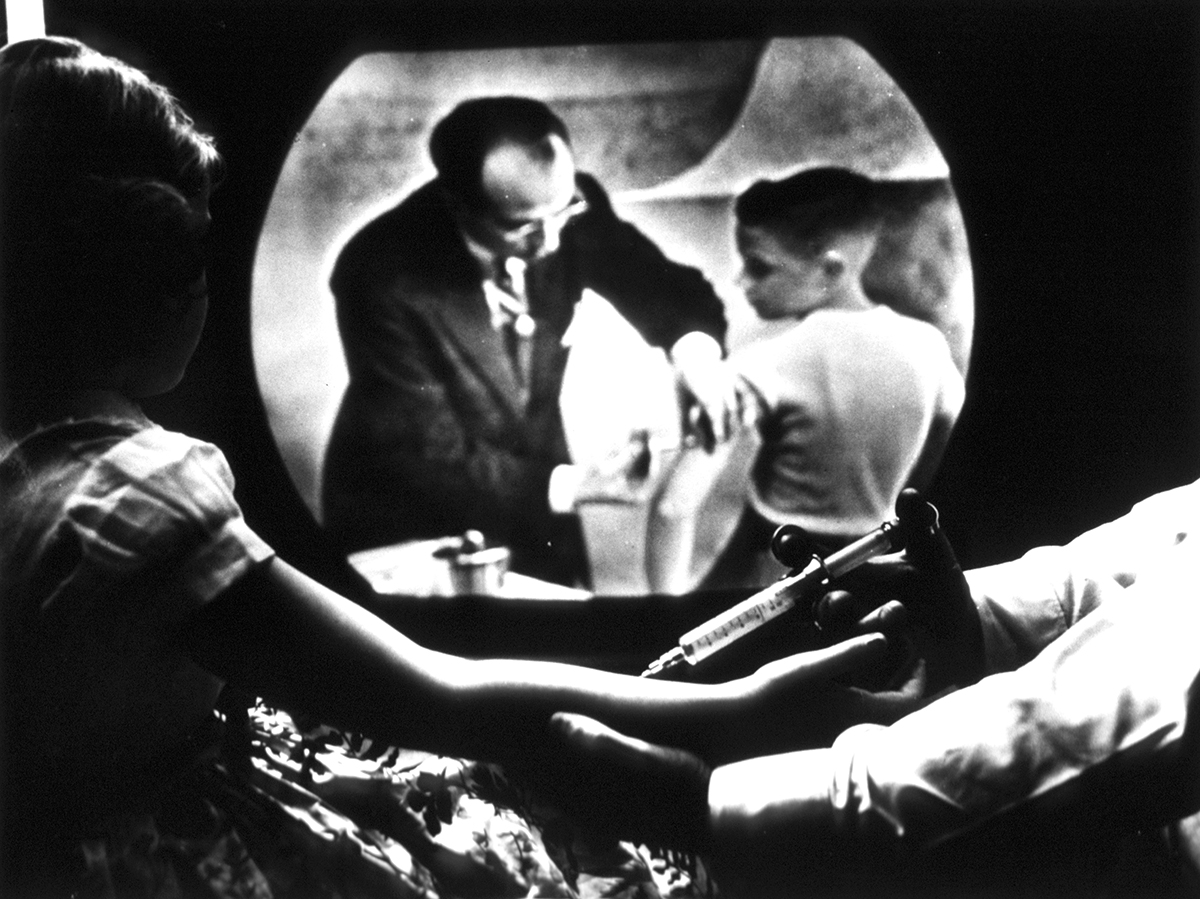 Child watches Jonas Salk on TV, 1955